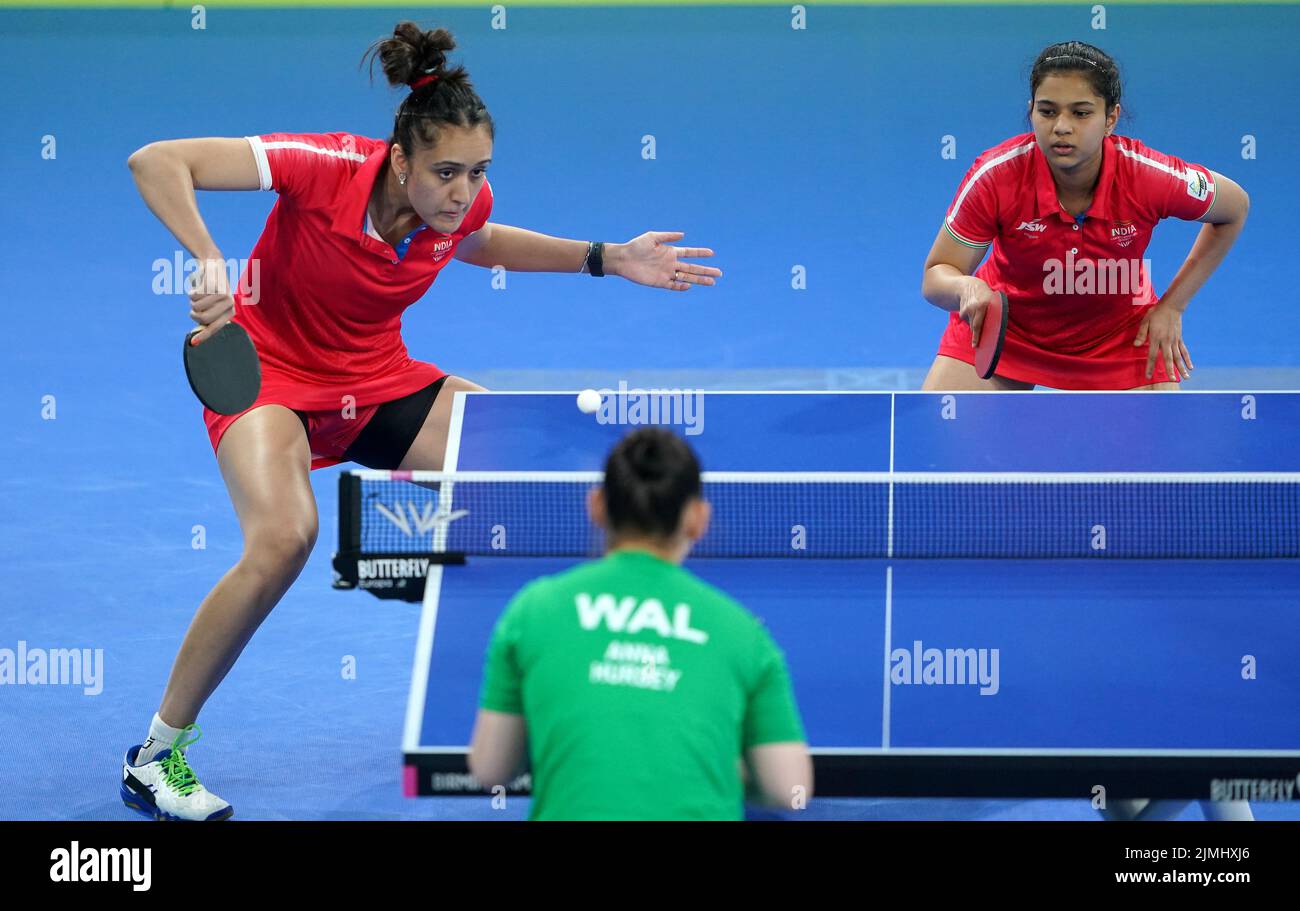 India's Manika Batra and Parag Diya Chitale in action during their match against Wales' Charlotte Carey and Anna Hursey during the Table Tennis Women's Doubles - Quarter-Final 1 matchat The NEC on day nine of the 2022 Commonwealth Games in Birmingham. Picture date: Saturday August 6, 2022. Stock Photo