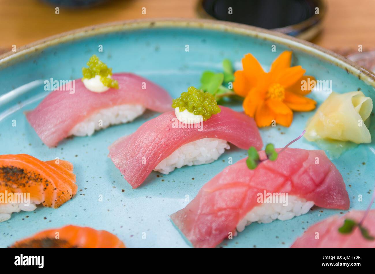 Assorted premium tuna and salmon nigiri sushi. Stock Photo