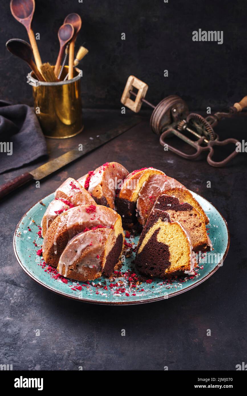 Traditional exotically bundt marble cocoa chocolate cake with icing