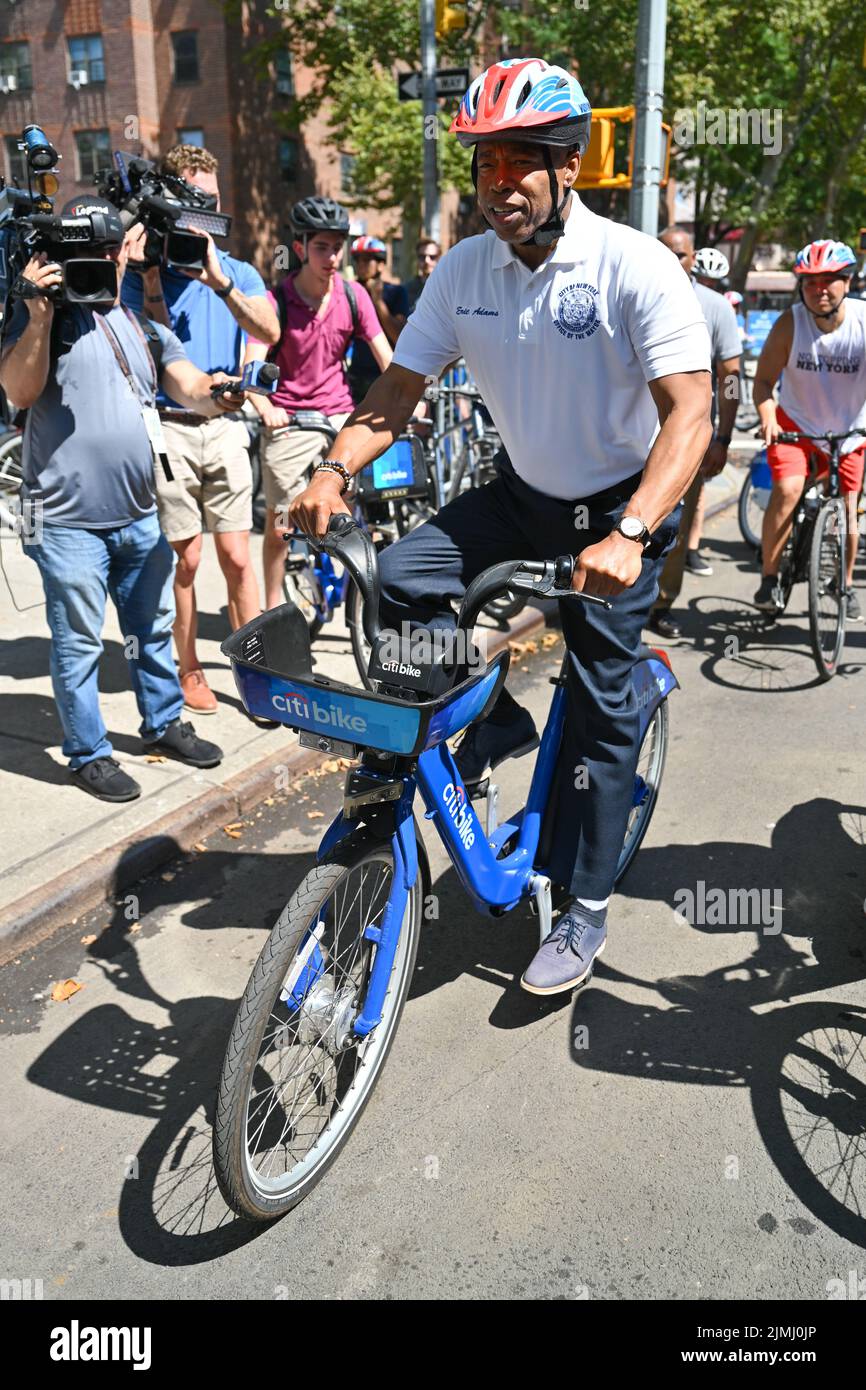 Mayor Eric Adams rides a Citibike as he participates in the Summer Streets event on August 6, 2022 in New York. Summer Streets is an annual initiative Stock Photo