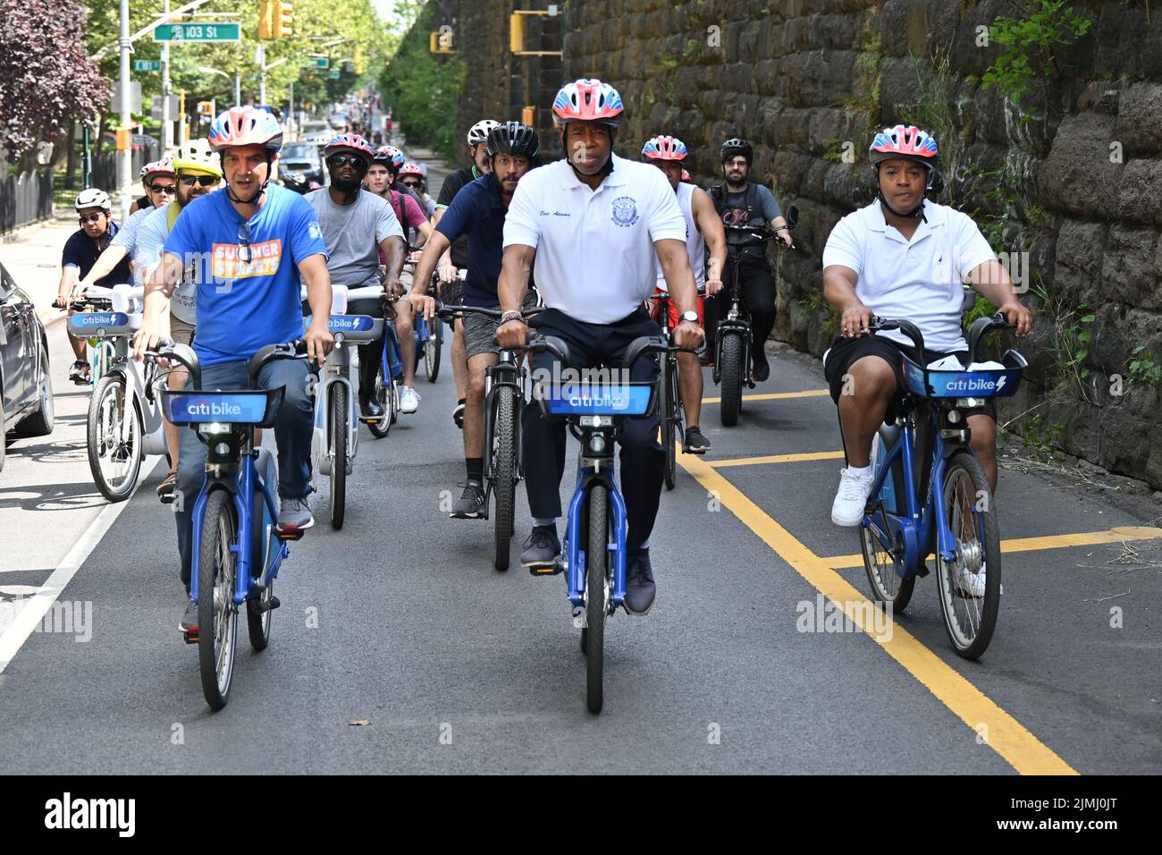 Mayor Eric Adams rides a Citibike as he participates in the Summer Streets event on August 6, 2022 in New York. Summer Streets is an annual initiative Stock Photo
