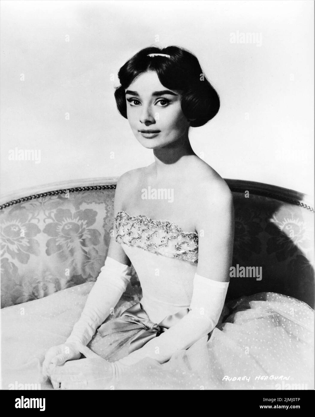 AUDREY HEPBURN Portrait in LOVE IN THE AFTERNOON 1957 director BILLY WILDER screenplay by Billy Wilder and I.A.L. Diamond wardrobe for Audrey Hepburn Hubert de Givenchy Billy Wilder Productions / Allied Artists Pictures Stock Photo