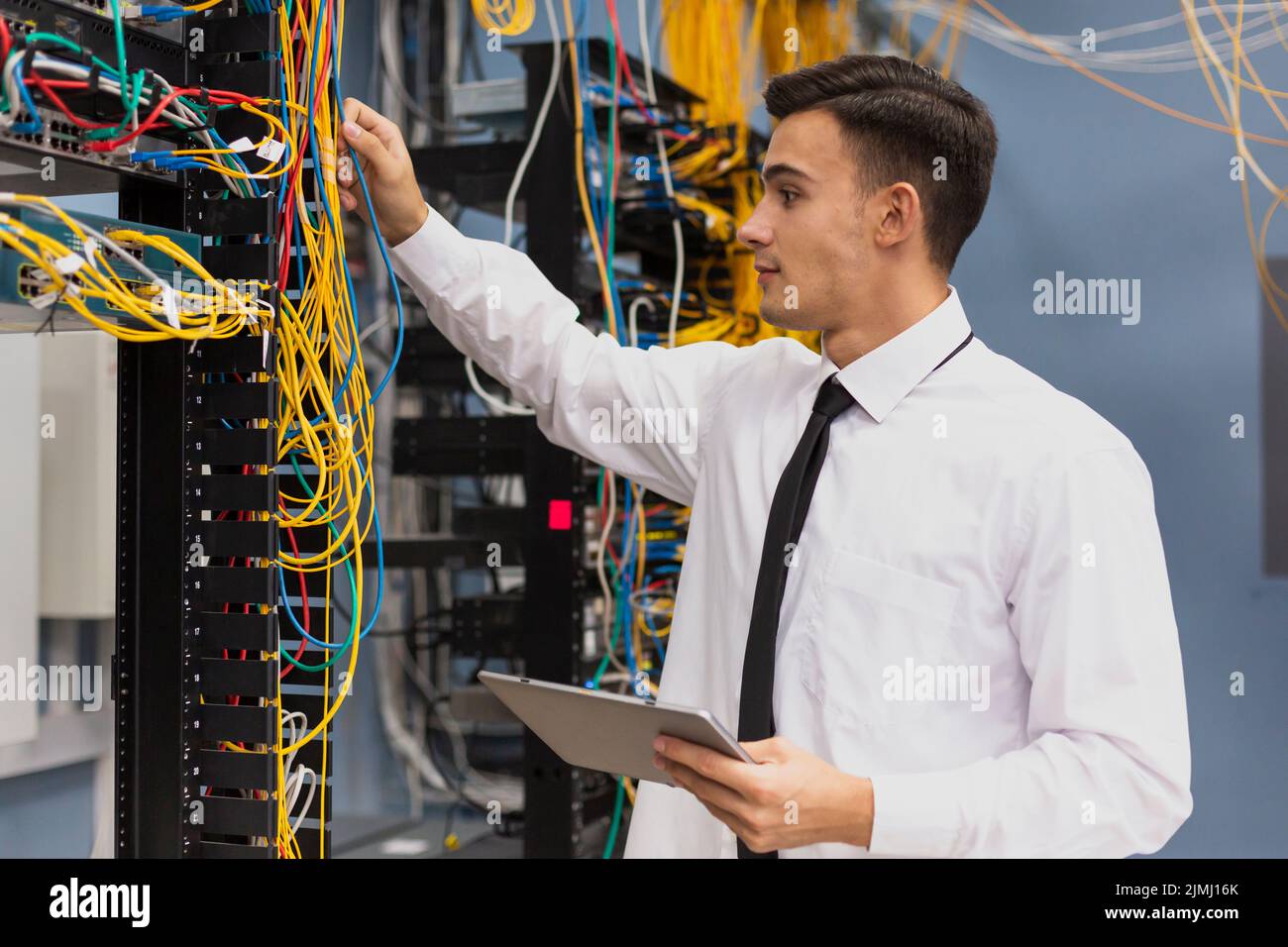 Young business engineer with tablet medium shot Stock Photo
