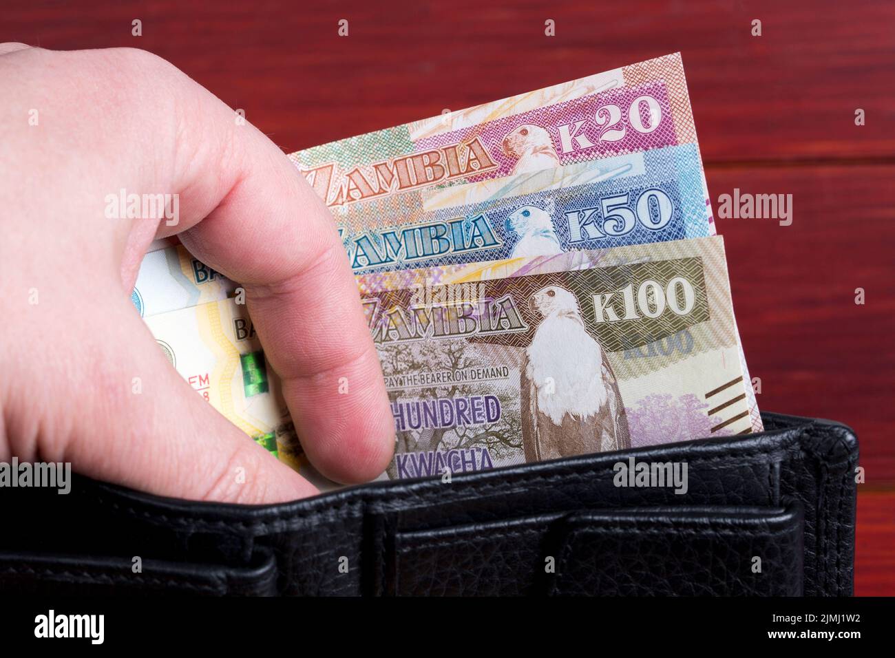 Zambian money Kwacha in the black wallet Stock Photo Alamy