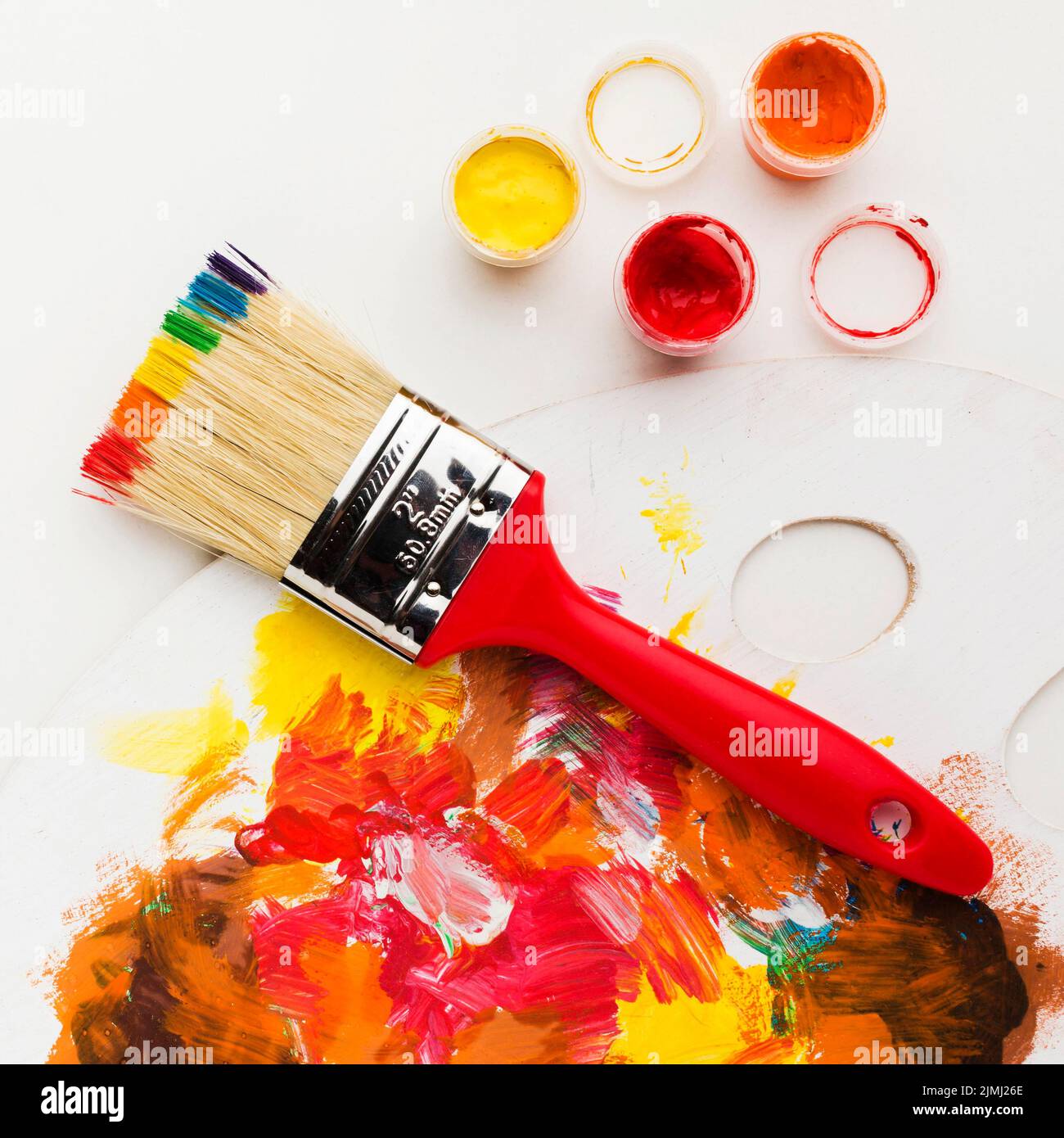 Brush with rainbow paint design Stock Photo Alamy