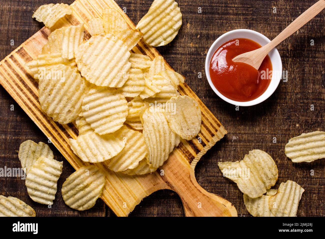 Top view potato chips with ketchup Stock Photo Alamy