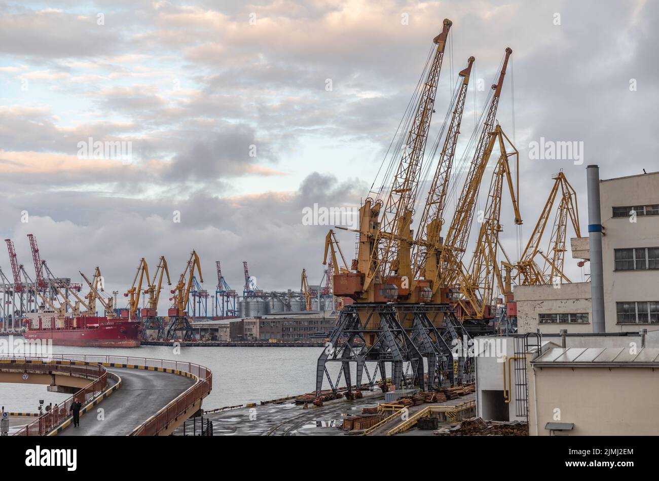 A view of the Industrial zone of Odessa sea port. For the first time since the beginning of the Russian war of aggression against Ukraine, a ship carrying grain has left the port of Odessa. This should make millions of tons of grain available again for the world market. Before the Russian war of aggression, Ukraine was one of the world's most important grain exporters. For them, billions in revenue from the sale of wheat and corn, among other commodities, is at stake. Stock Photo