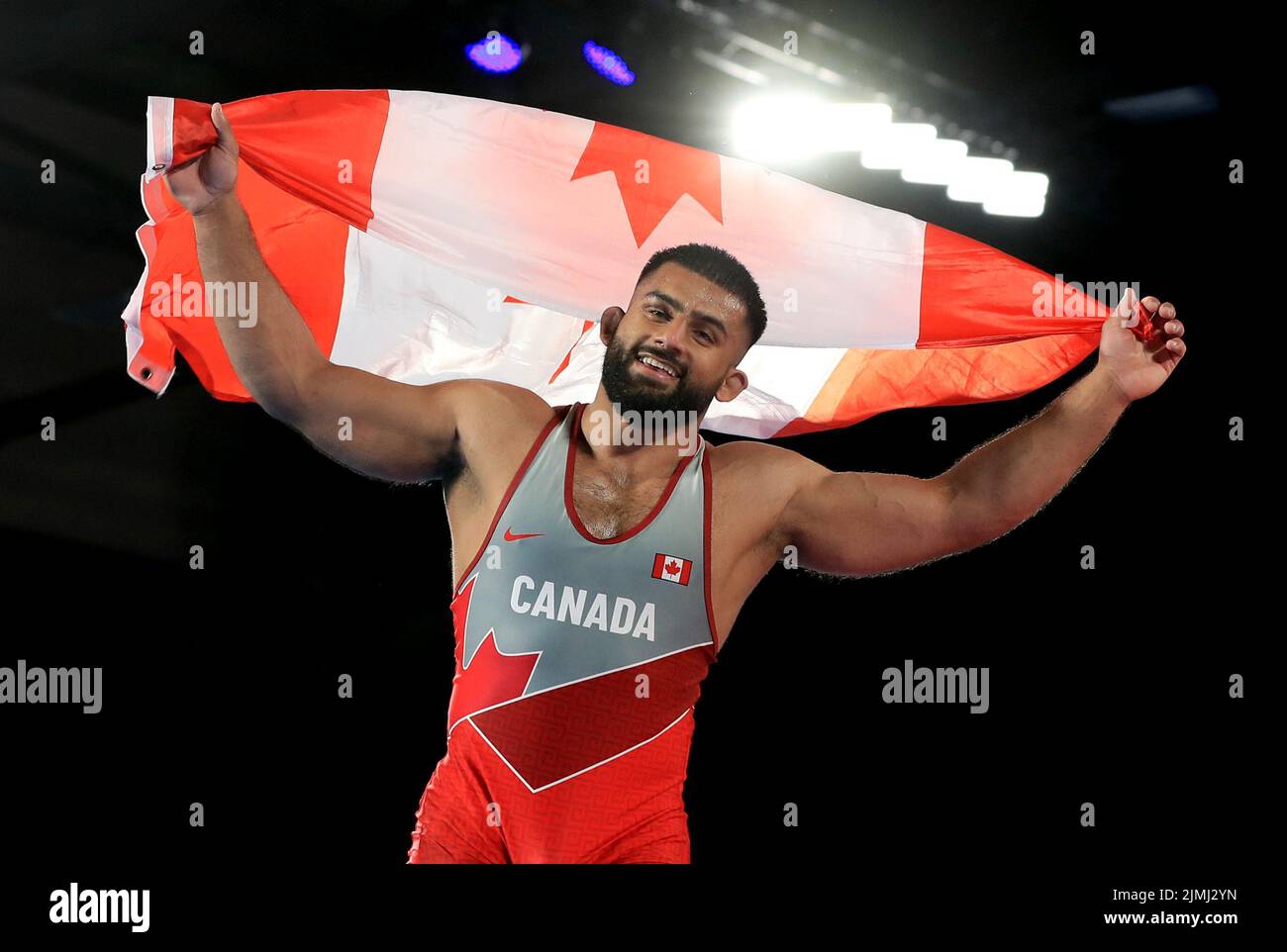 Canada’s Nishan Randhawa celebrates winning against South Affrica’s Nicolaas de Lange in the Men’s 97kg Gold Medal match at the Coventry Arena on day nine of the 2022 Commonwealth Games. Picture date: Saturday August 6, 2022. Stock Photo