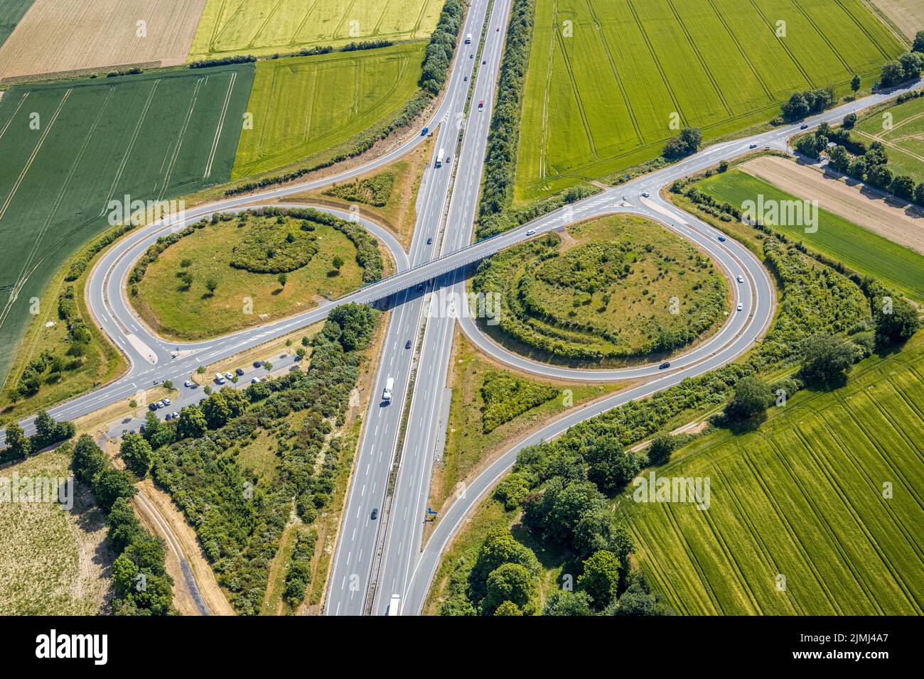 Aerial view, freeway A44 junction 55 Werl-Süd, parking lot Werl-Süd, federal road B516, Neheimer Straße, Werl, Soester Börde, North Rhine-Westphalia, Stock Photo
