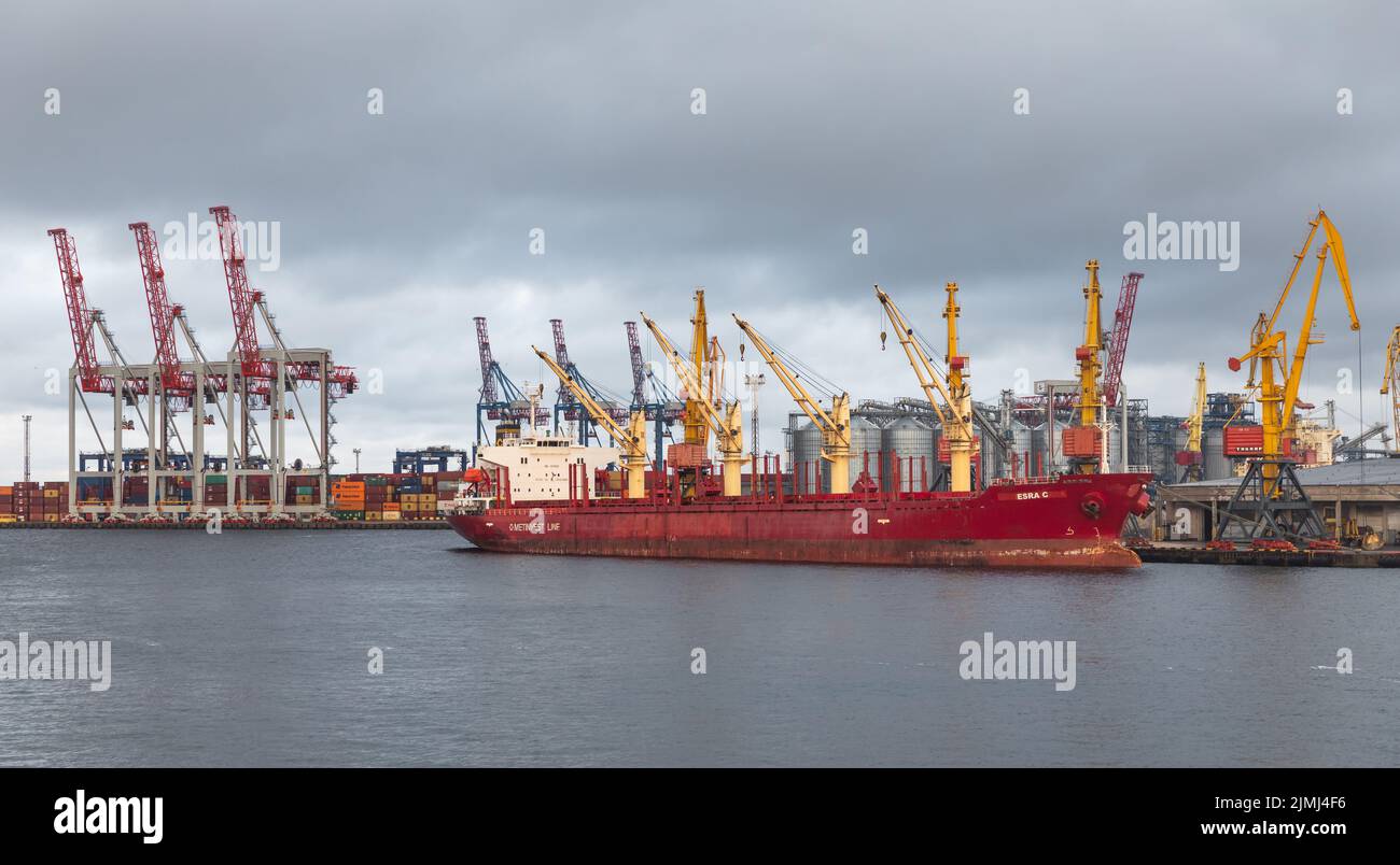 Odessa, Ukraine. 10th Sep, 2018. Commercial merchant ship during loading operations at the Odessa seaport against the backdrop of loading cranes during sunset. For the first time since the beginning of the Russian war of aggression against Ukraine, a ship carrying grain has left the port of Odessa. This should make millions of tons of grain available again for the world market. Before the Russian war of aggression, Ukraine was one of the world's most important grain exporters. For them, billions in revenue from the sale of wheat and corn, among other commodities, is at stake. (Credit Image Stock Photo