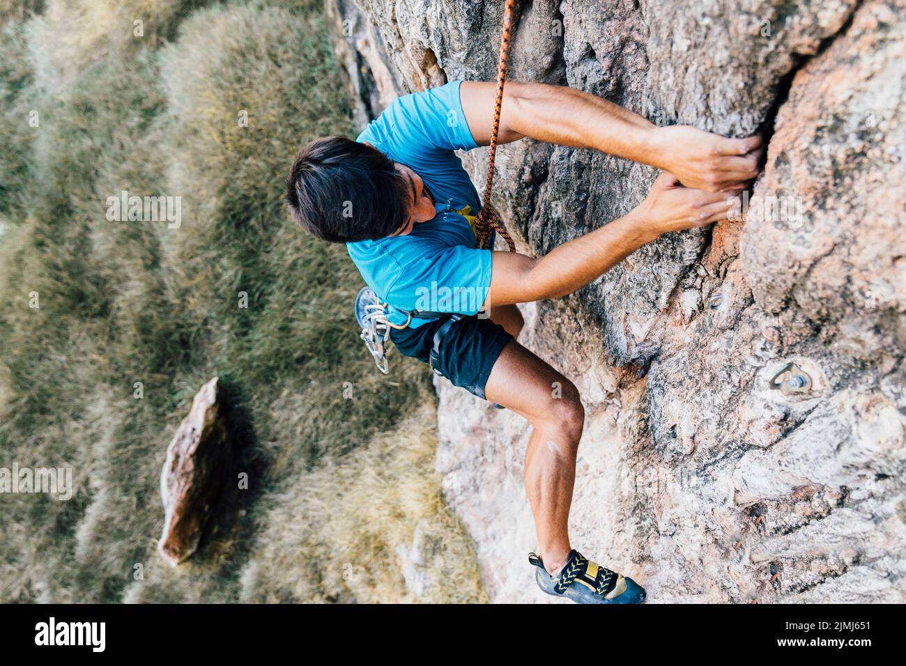 Rock climber steep wall Stock Photo