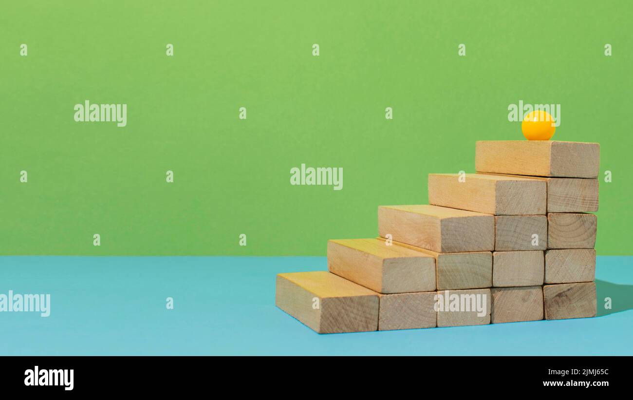 Yellow ball stairs with copy space Stock Photo