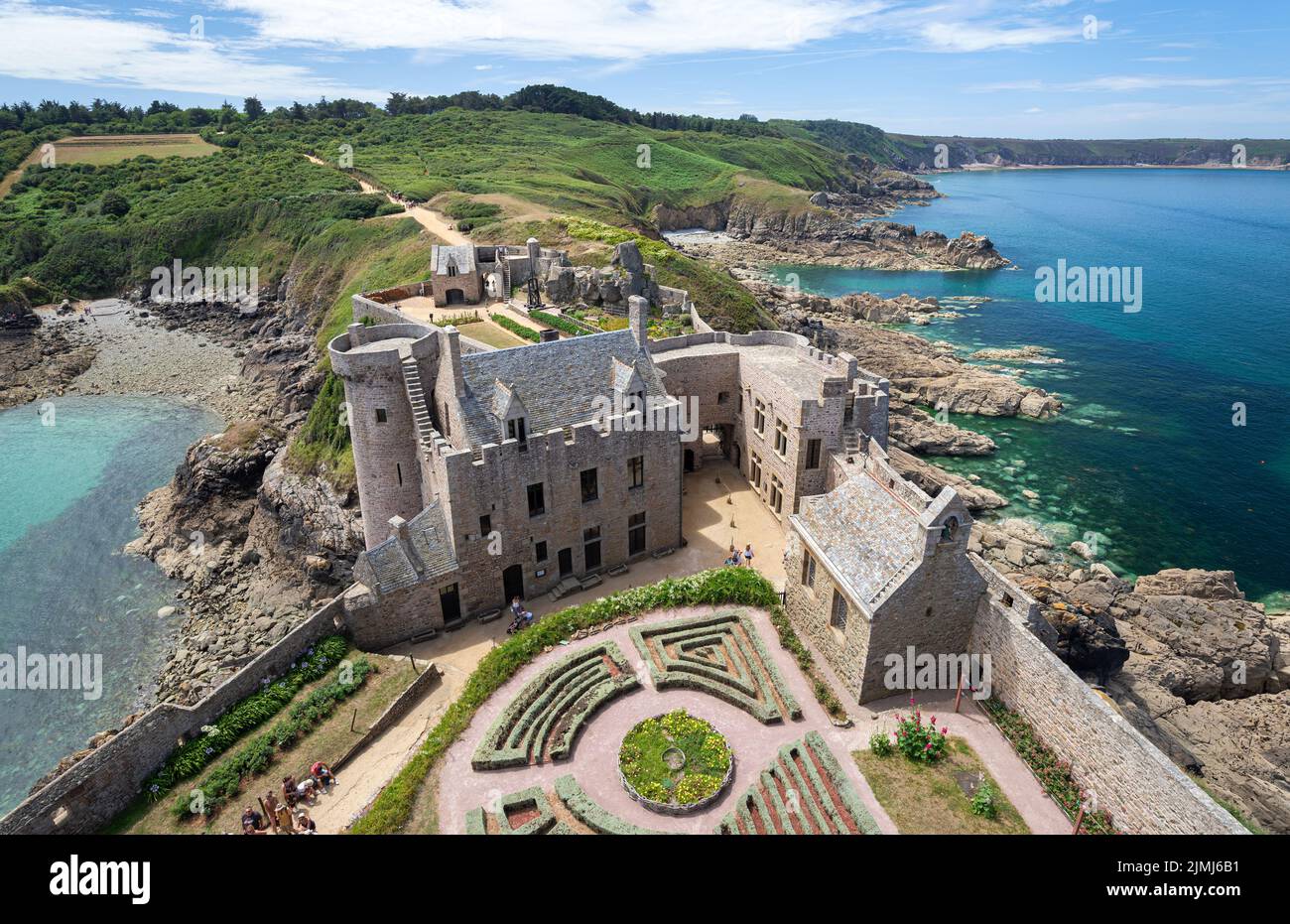 top view of Fort la Latte (or the Castle of the Rock Goyon) and the deep blue sea on each side from tower over inner courtyard. Stock Photo