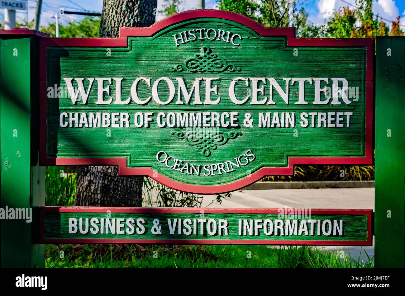 A sign stands at the entrance of the Ocean Springs Chamber of Commerce and Main Street tourism bureau, which is housed in the Ocean Springs L&N Depot. Stock Photo