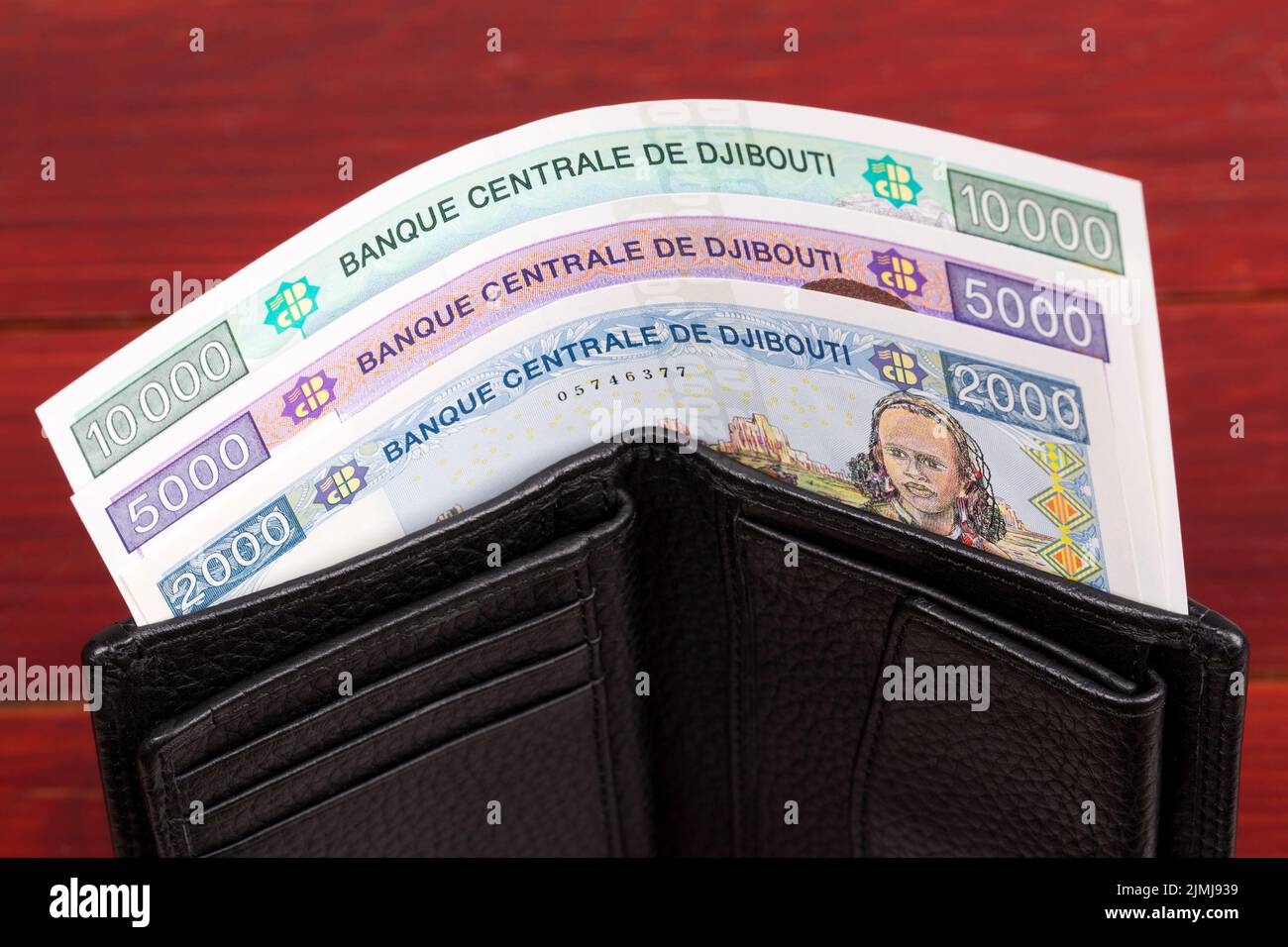 Djiboutian money - franc in the black wallet Stock Photo