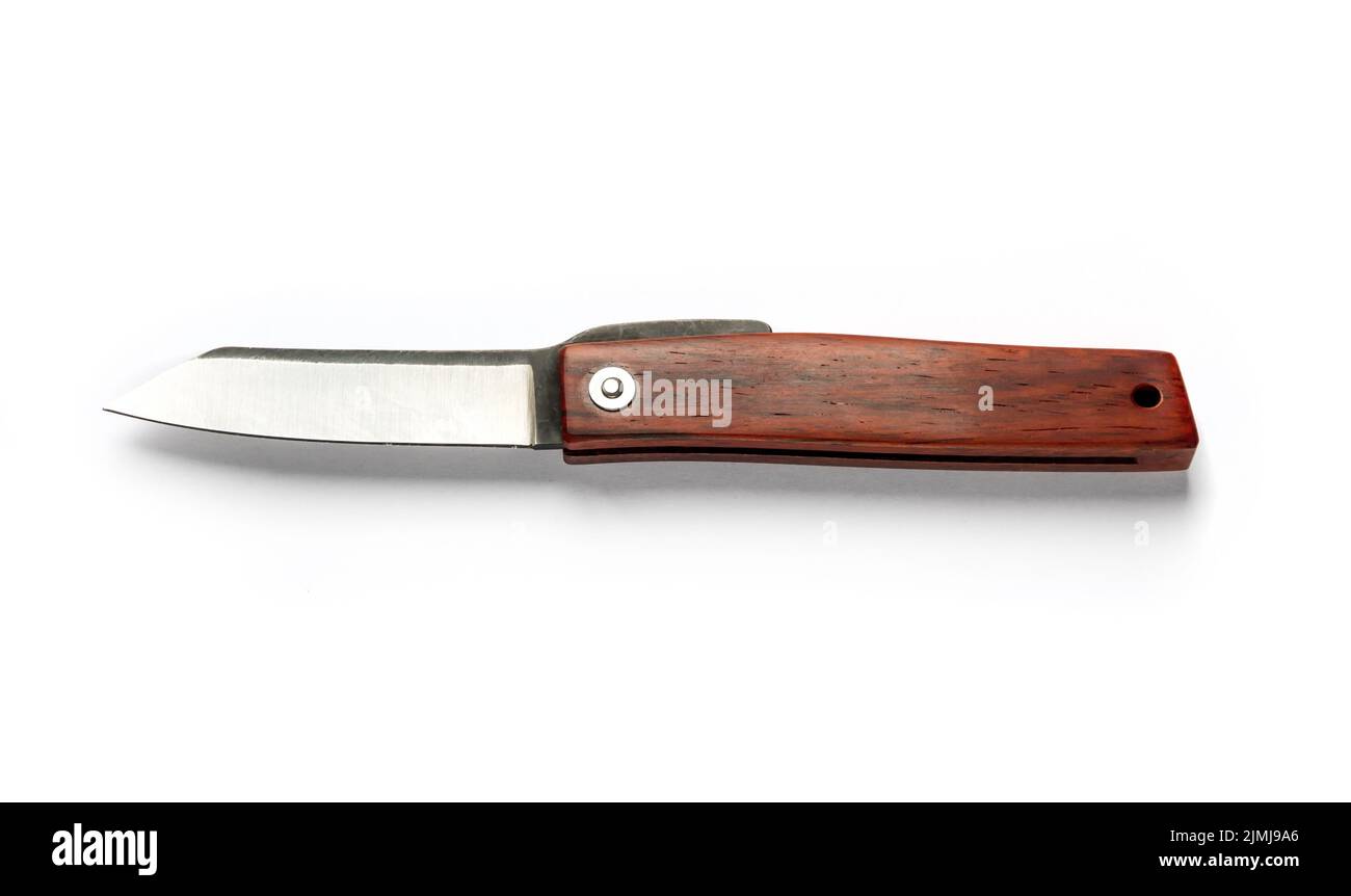 Traditional wooden japanese pocket knife isolated on white background