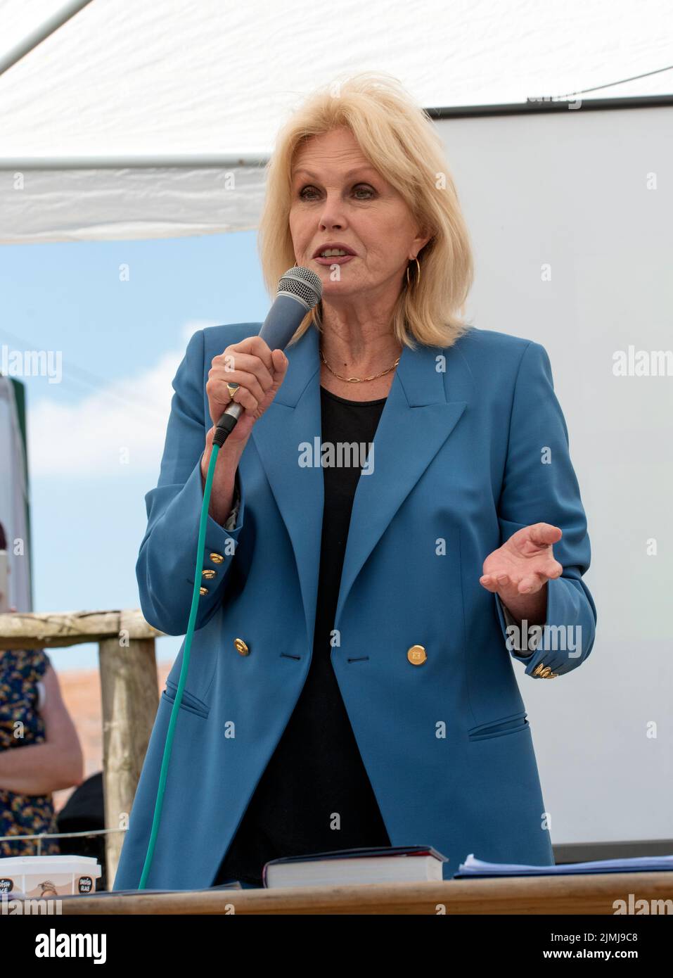 Dame Joanna Lumley Speaking at The Farm Animal Sanctuary in Evesham on August 6th 2022. Vegetarian Joanna is a patron of The Farm Animal Sanctuary, which was Britain's first ever farm animal sanctuary. Stock Photo