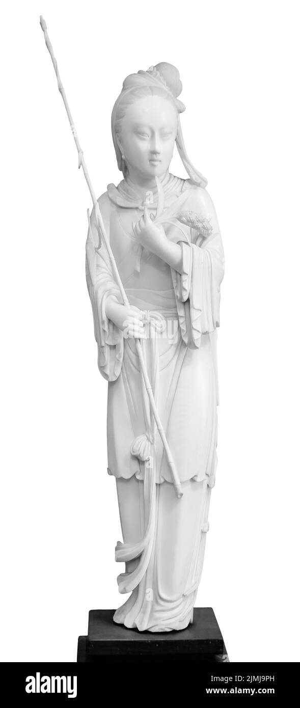 Geisha figurine in national dress, kimono traditional hair, fan in her hand. Souvenir doll, isolated on white background with cl Stock Photo
