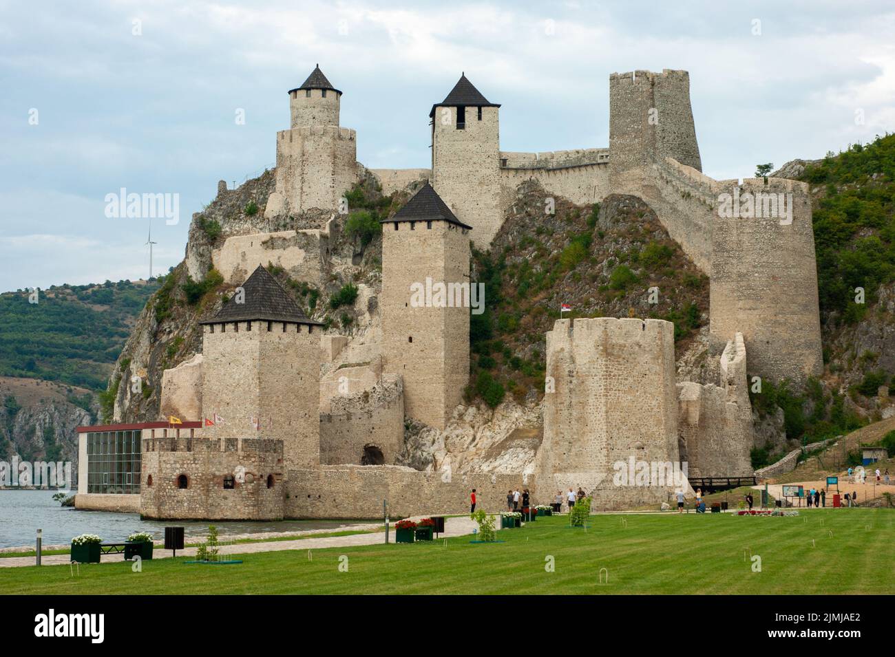 Golubac Fortress from medieval times sits at the Danube River in a unique picturesque site. It has been rebuilt with a museum in its interior. Stock Photo