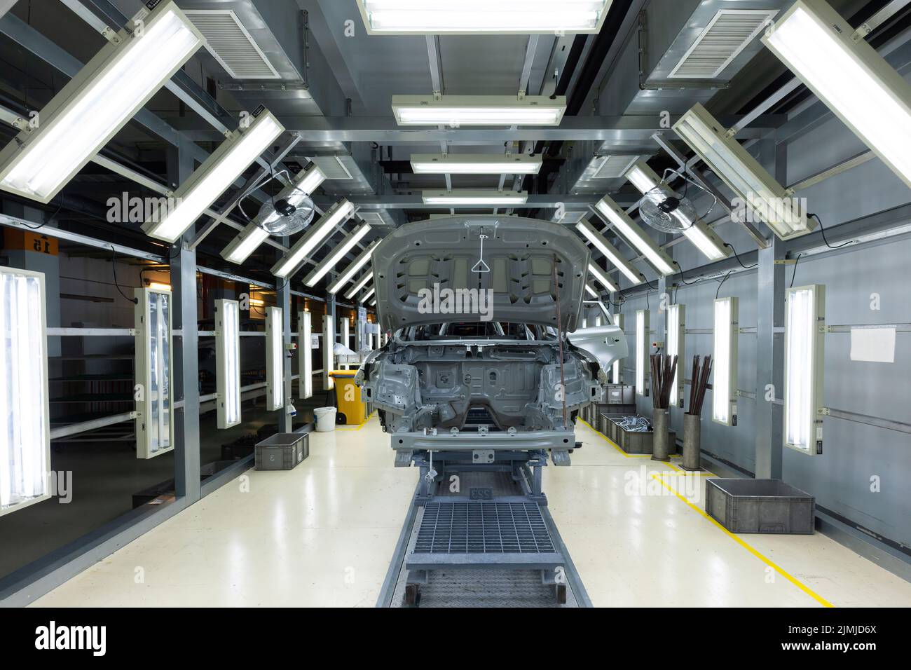 Car body is on assembly line. Factory for production of cars. Modern automotive industry Stock Photo