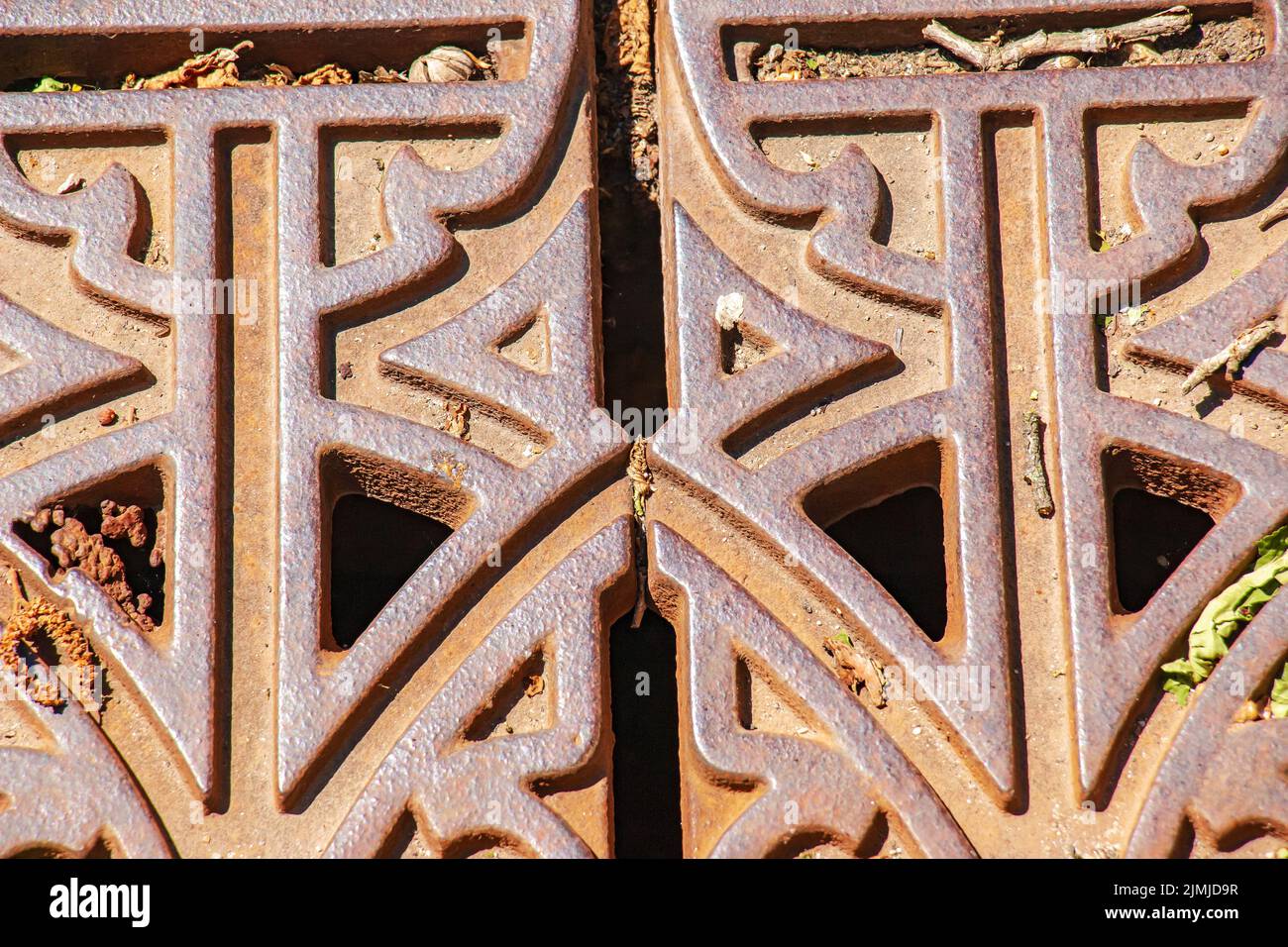 Close-up iron grate drainage system for draining rainwater in Slovakia. Stock Photo