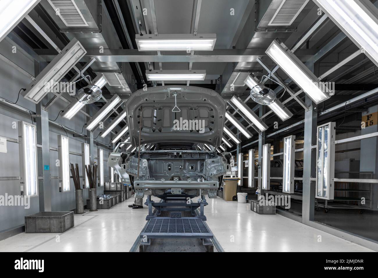 Car body is on assembly line. Factory for production of cars. Modern automotive industry Stock Photo