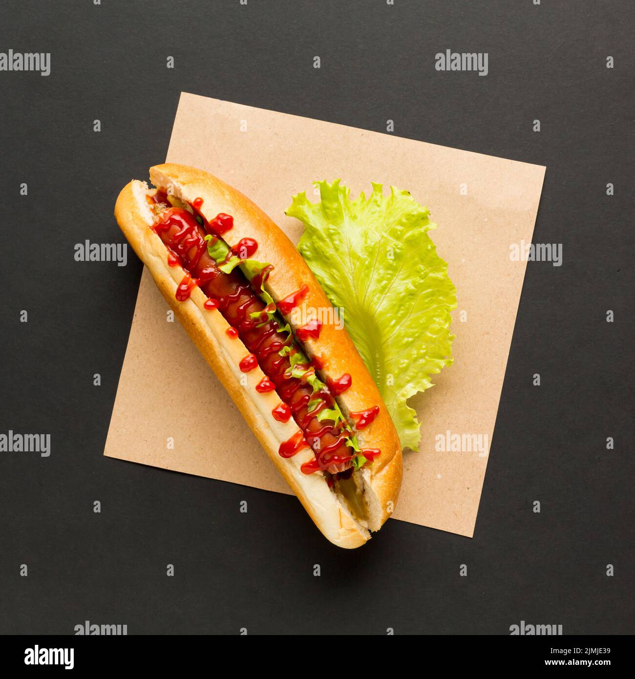 Hot dog with lettuce top view Stock Photo Alamy