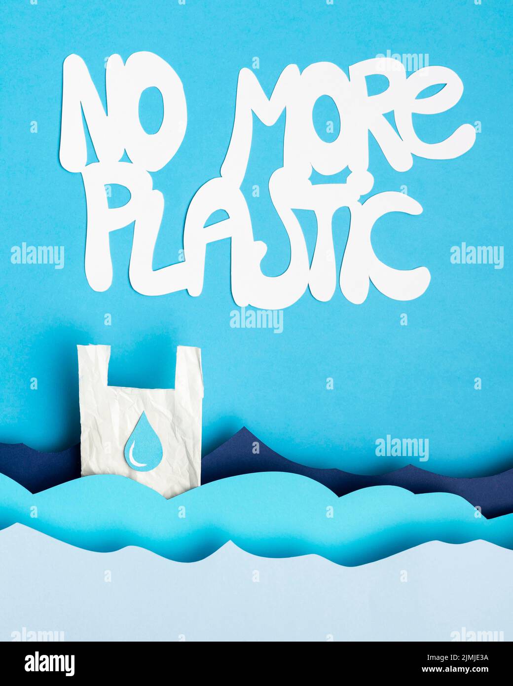 Top view paper ocean waves with plastic bag message Stock Photo Alamy