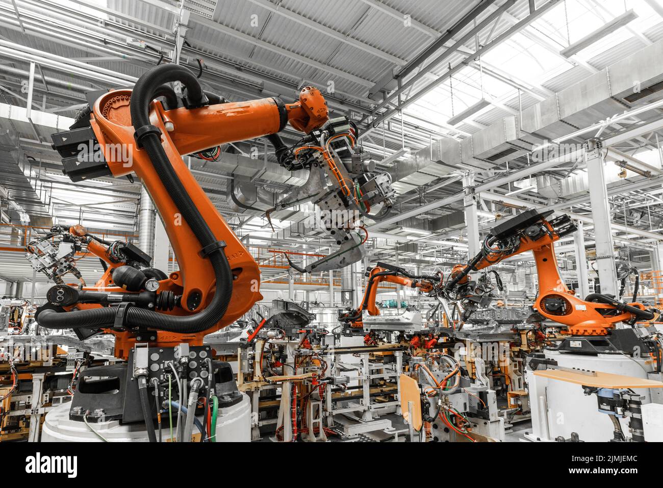 Photo of automobile production line. Welding car body. Modern car