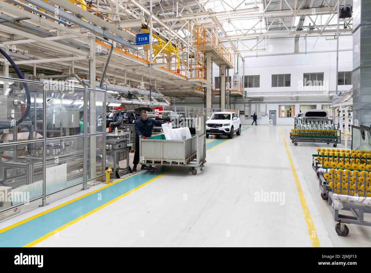 Minsk, Belarus - Dec 15, 2021: Car bodies are on assembly line. Factory for production of cars. Modern automotive industry. A ca Stock Photo