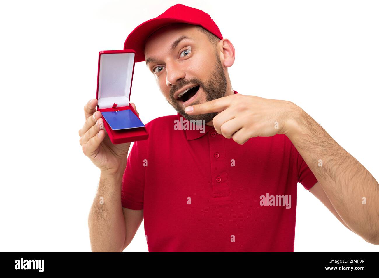 Courier delivery specialist demonstrates a discount or bank card Stock Photo