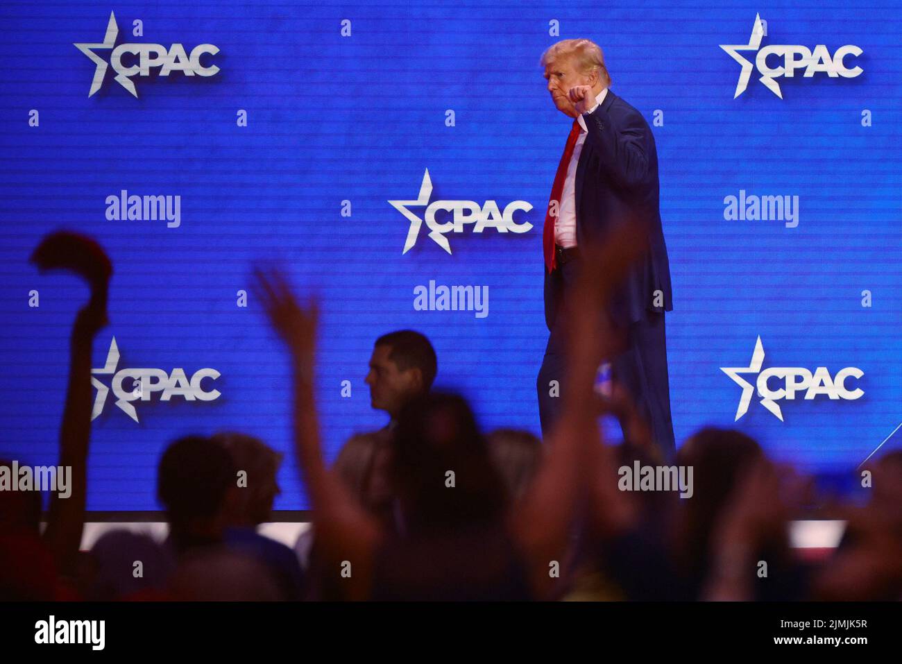 Former U.S. President Donald Trump walks off-stage after speaking at the Conservative Political Action Conference (CPAC) in Dallas, Texas, U.S., August 6, 2022.  REUTERS/Brian Snyder Stock Photo