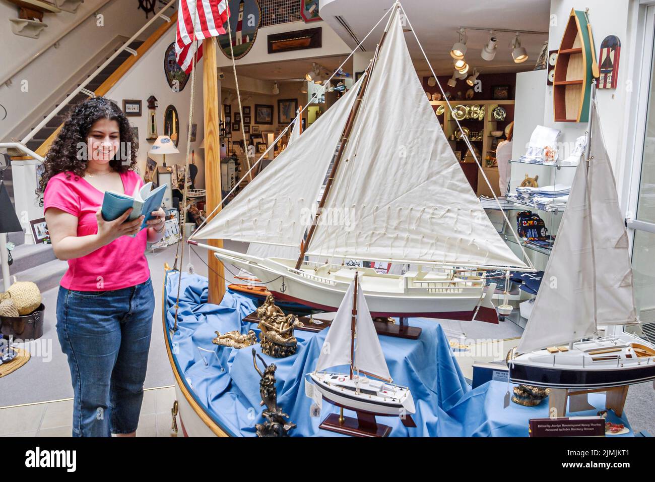 Newport News Virginia,Mariners' Museum and Park,history collection exhibits inside interior displays ship models sailboats woman visiting tourist Stock Photo