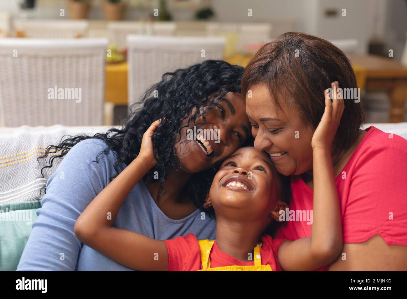Happy african american girl with mother and grandmother at home Stock ...