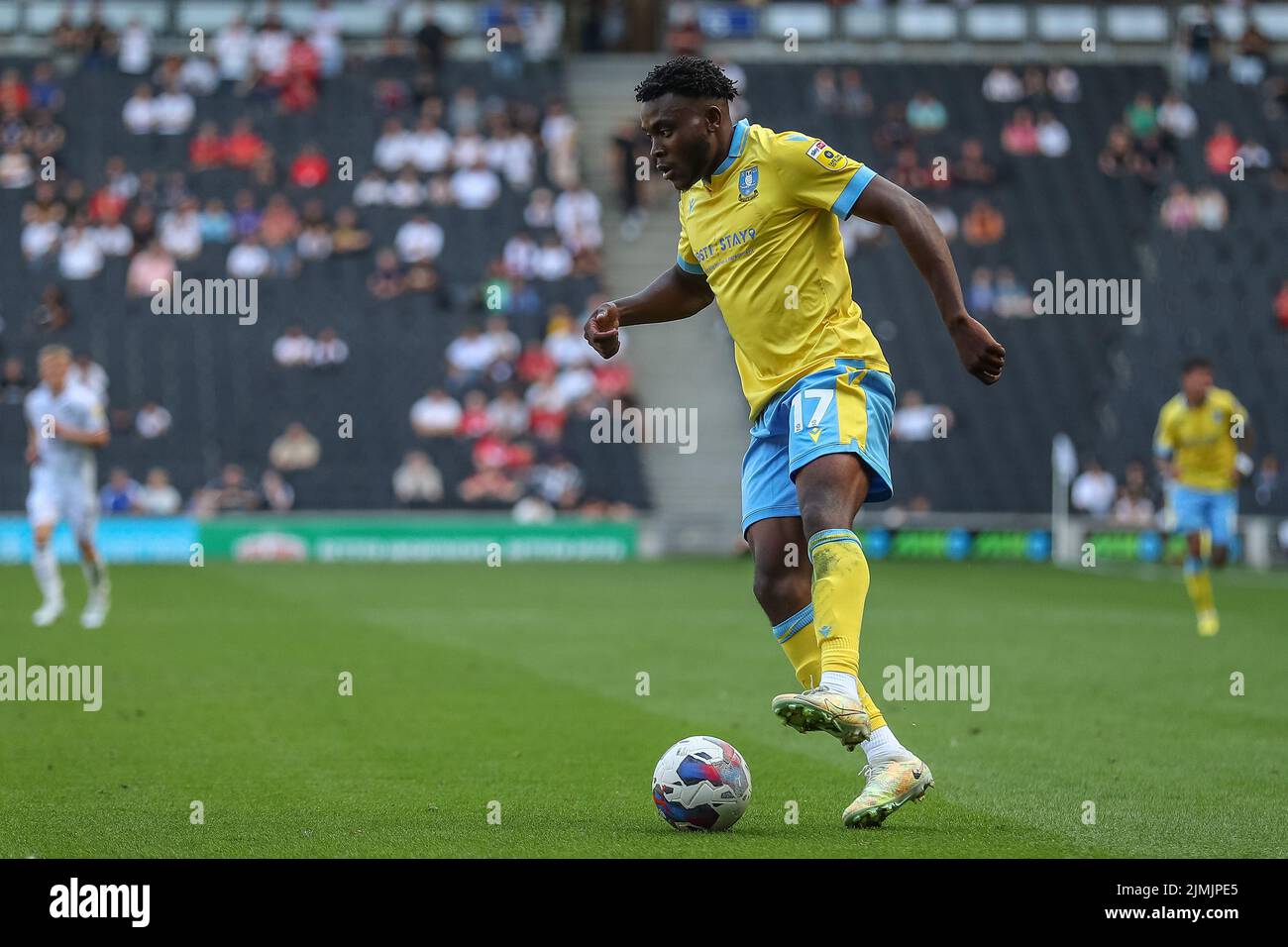 Fisayo Dele-Bashiru #17 of Sheffield Wednesday controls the ball Stock ...