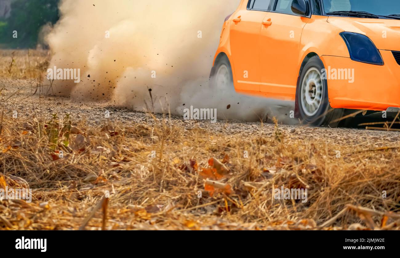 Rally racing car on dirt road Stock Photo - Alamy