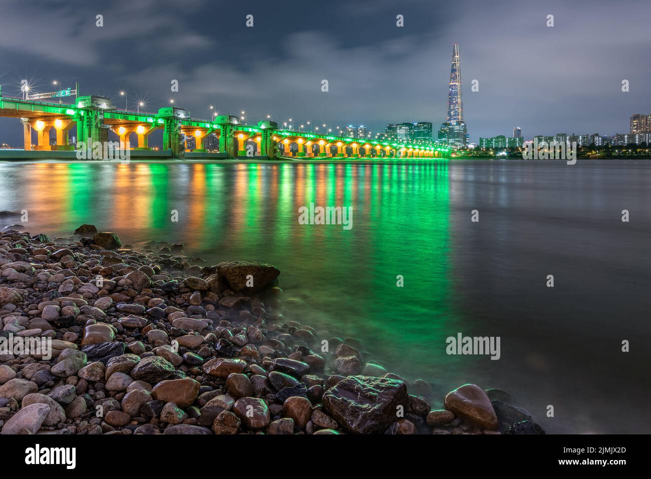 Night view of Jamsil bridge, Lotte World Tower skyscraper and Han River in Seoul South Korea on 5 August 2022 Stock Photo