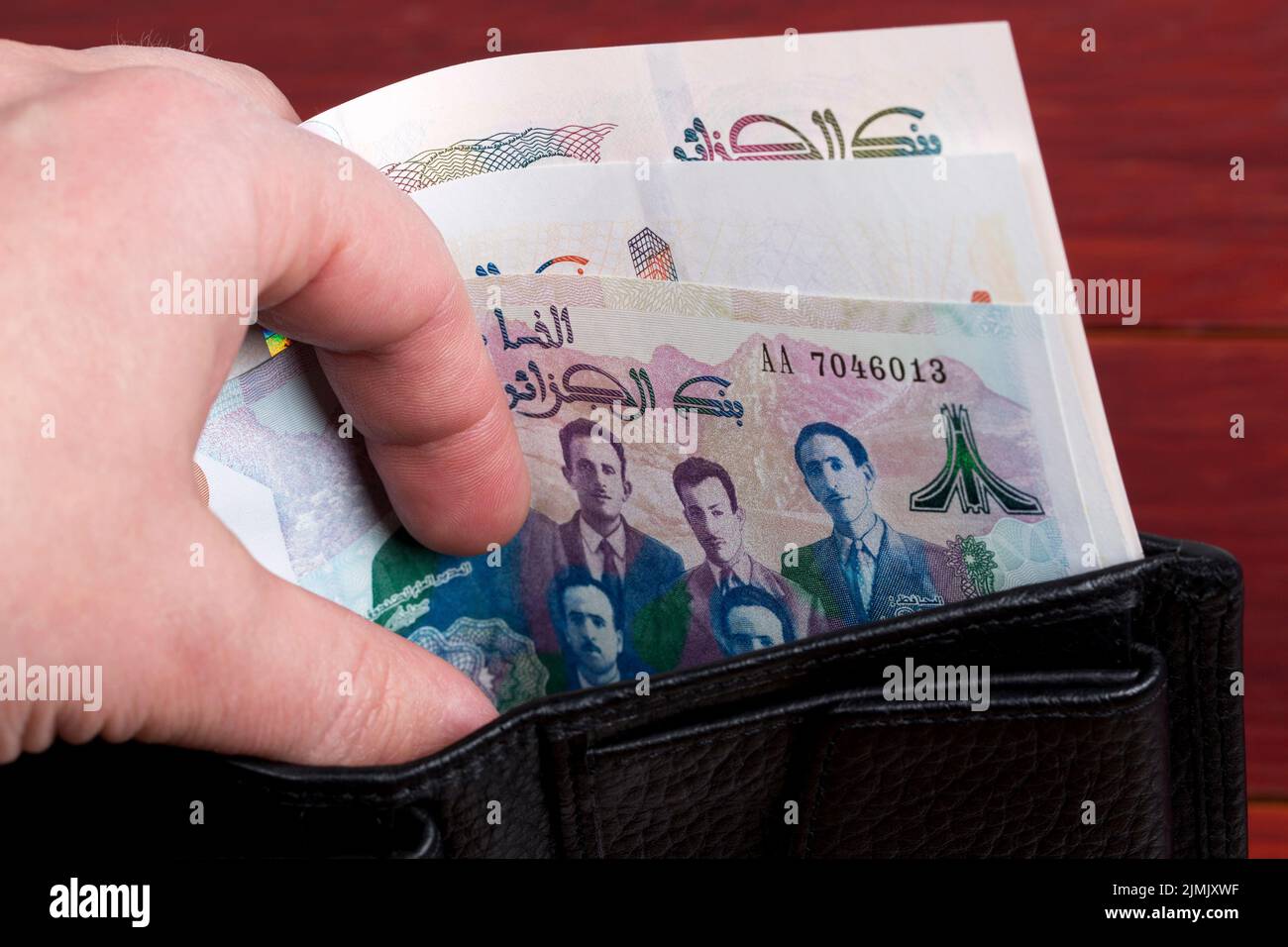 algerian-dinar-in-the-black-wallet-stock-photo-alamy