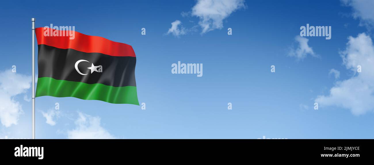 Libyan flag isolated on a blue sky. Horizontal banner Stock Photo
