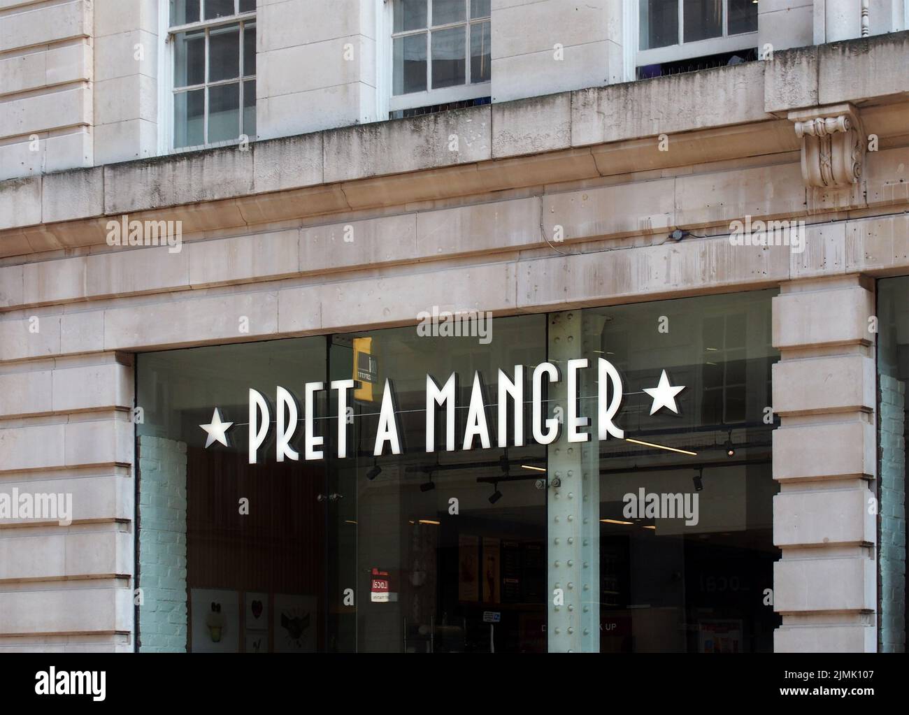 Sign above a pret a manger cafe and takeaway sandwich shop in manchester city centre Stock Photo