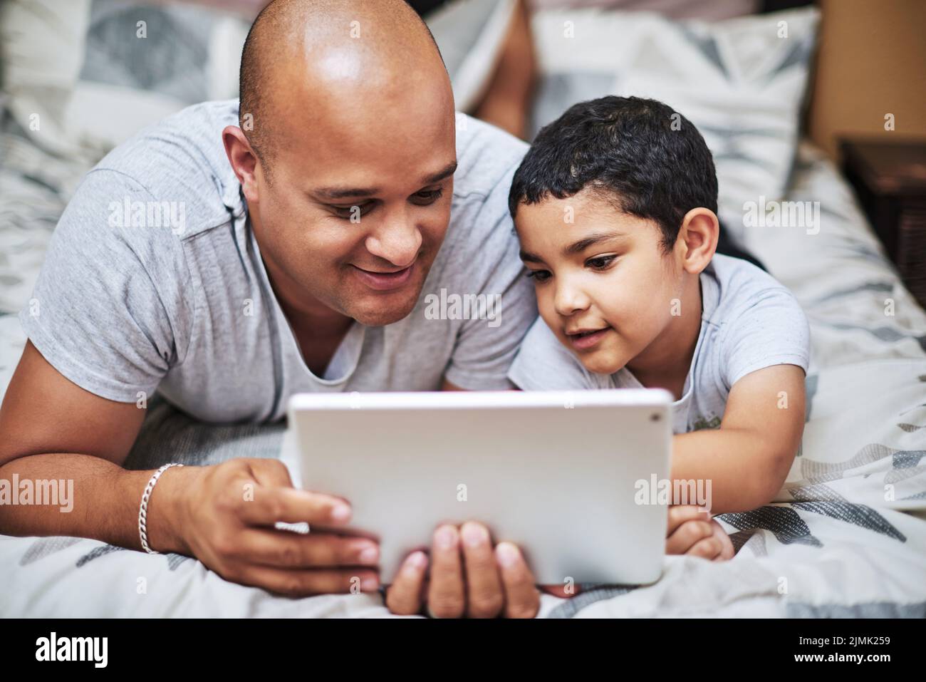 I wonder what will happen next. a cheerful young man and his son