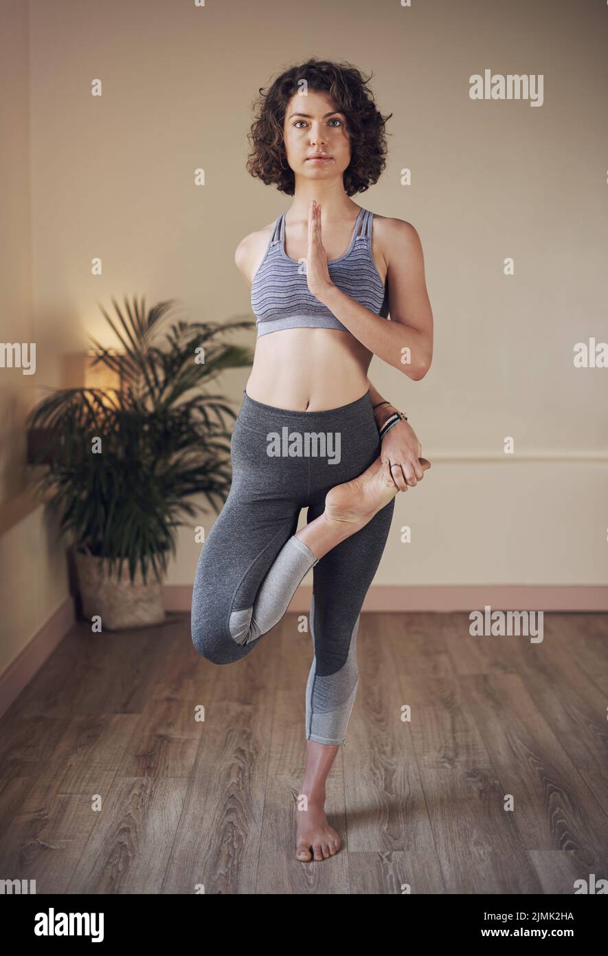 Yoga woman standing indoor hi-res stock photography and images - Alamy