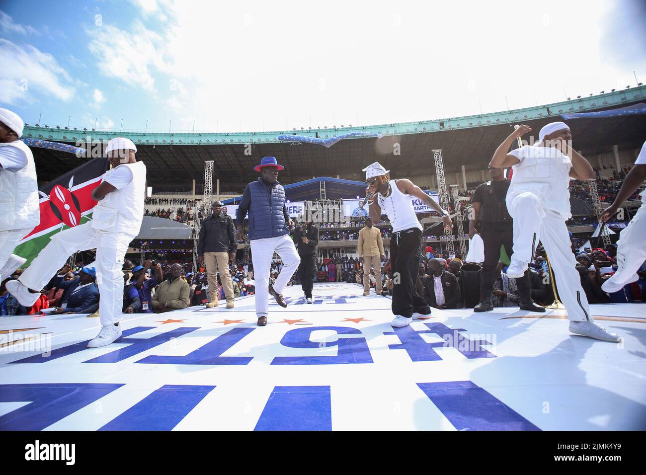 Tanzanian musician Diamond Platnumz dances with the former Kenyan Prime ...