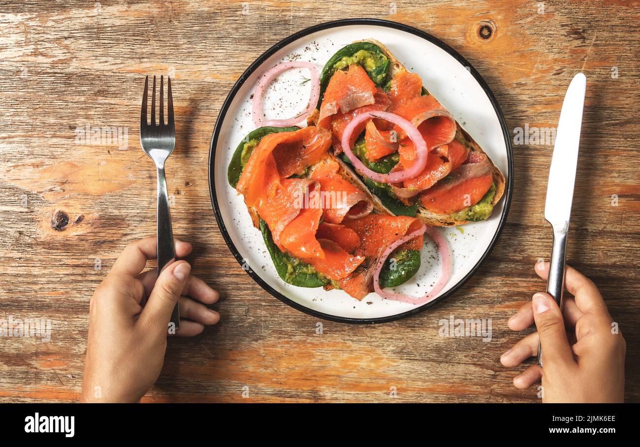 Female knife fork hands hi-res stock photography and images - Alamy