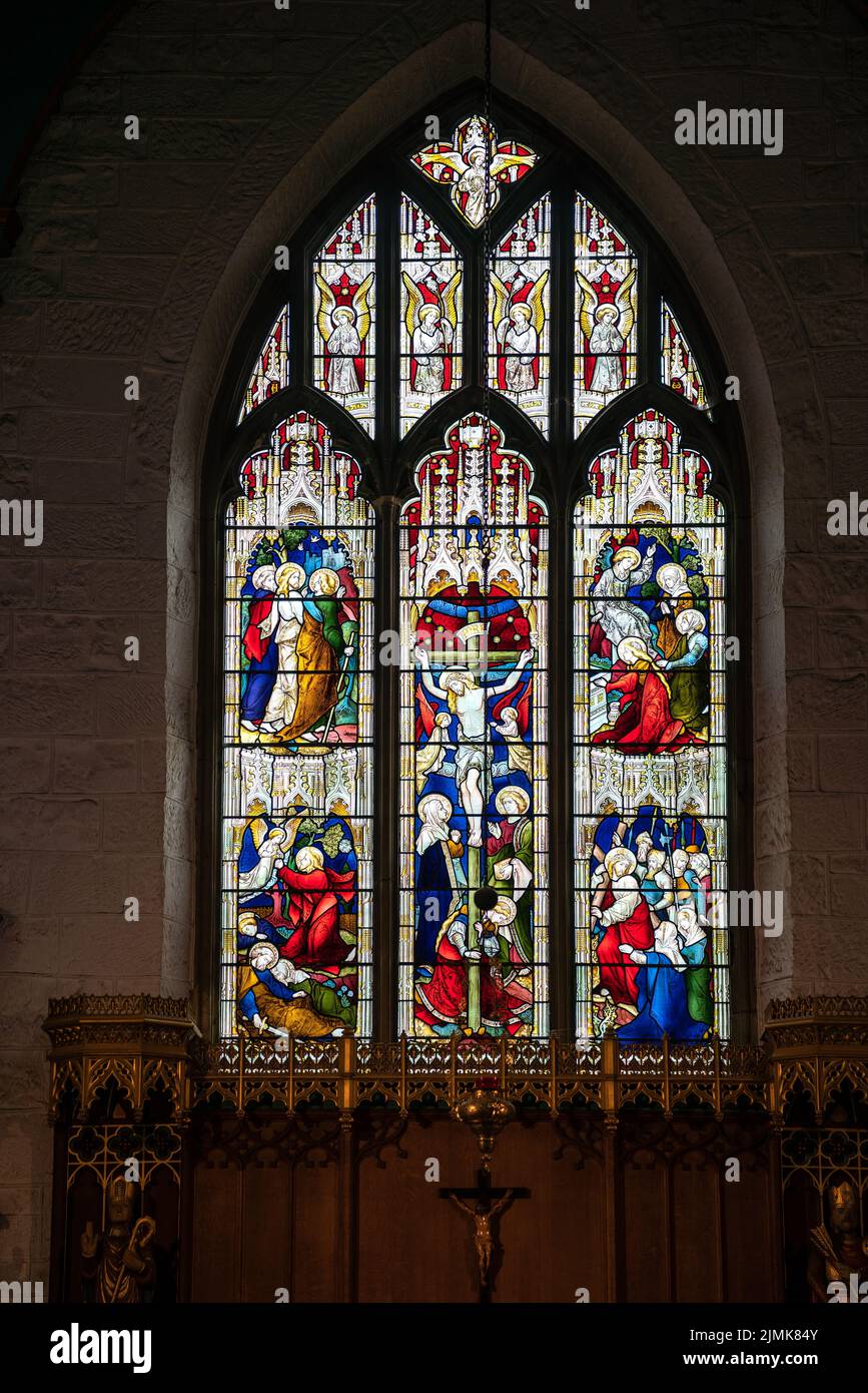 EAST GRINSTEAD, WEST SUSSEX, UK - MARCH 28: Stained glass window in St Swithuns Church , East Grinstead,  West Sussex on March 2 Stock Photo