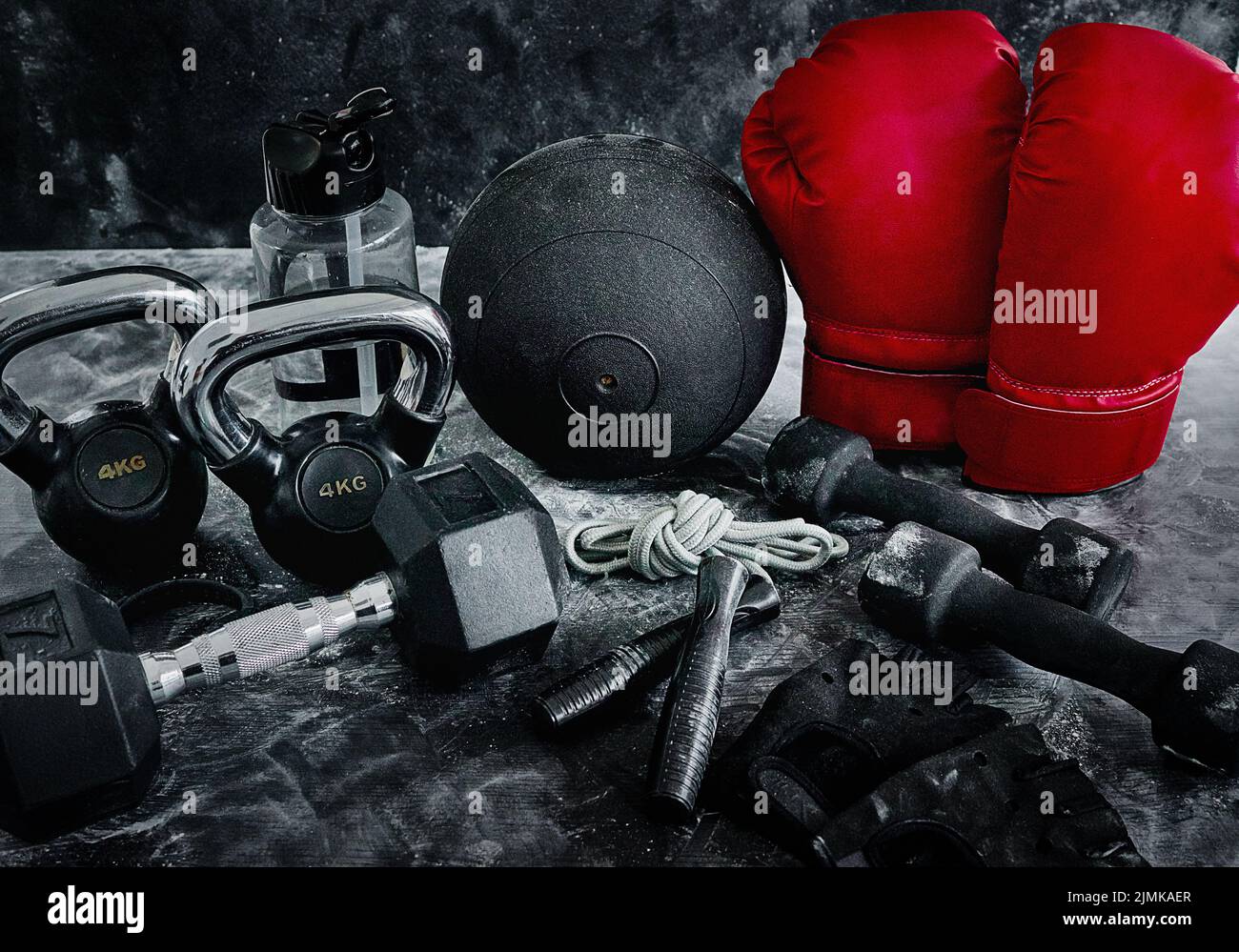 The gloves is all you need. High angle shot of boxing essentials placed on top of a dark