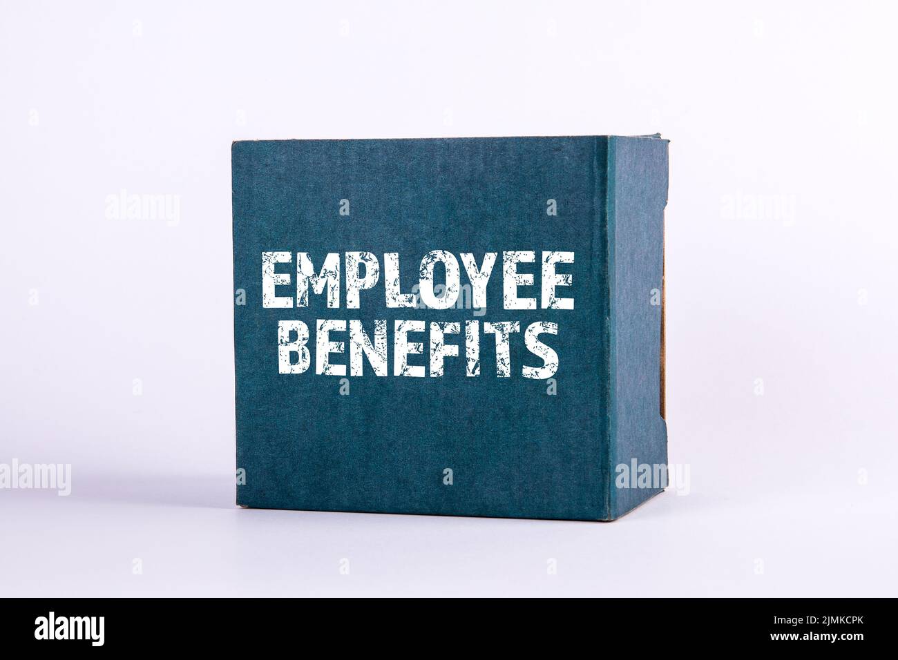 Employee Benefits. Blue cardboard box on a white background. Stock Photo