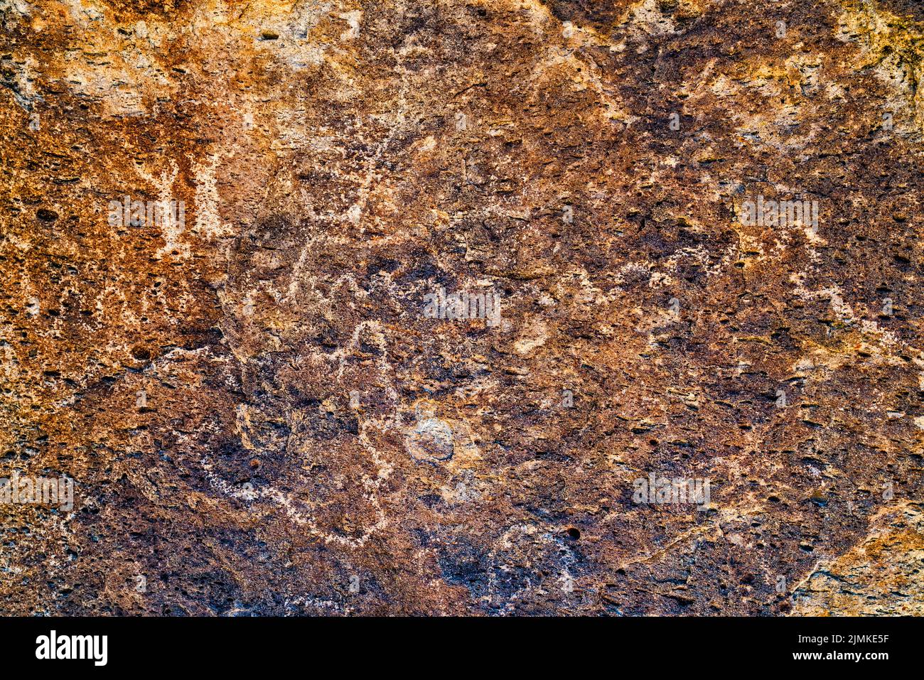 Petroglyphs at tuff rock boulder, Crystal Wash, Pahranagat Valley, near Ash Springs, Nevada, USA Stock Photo