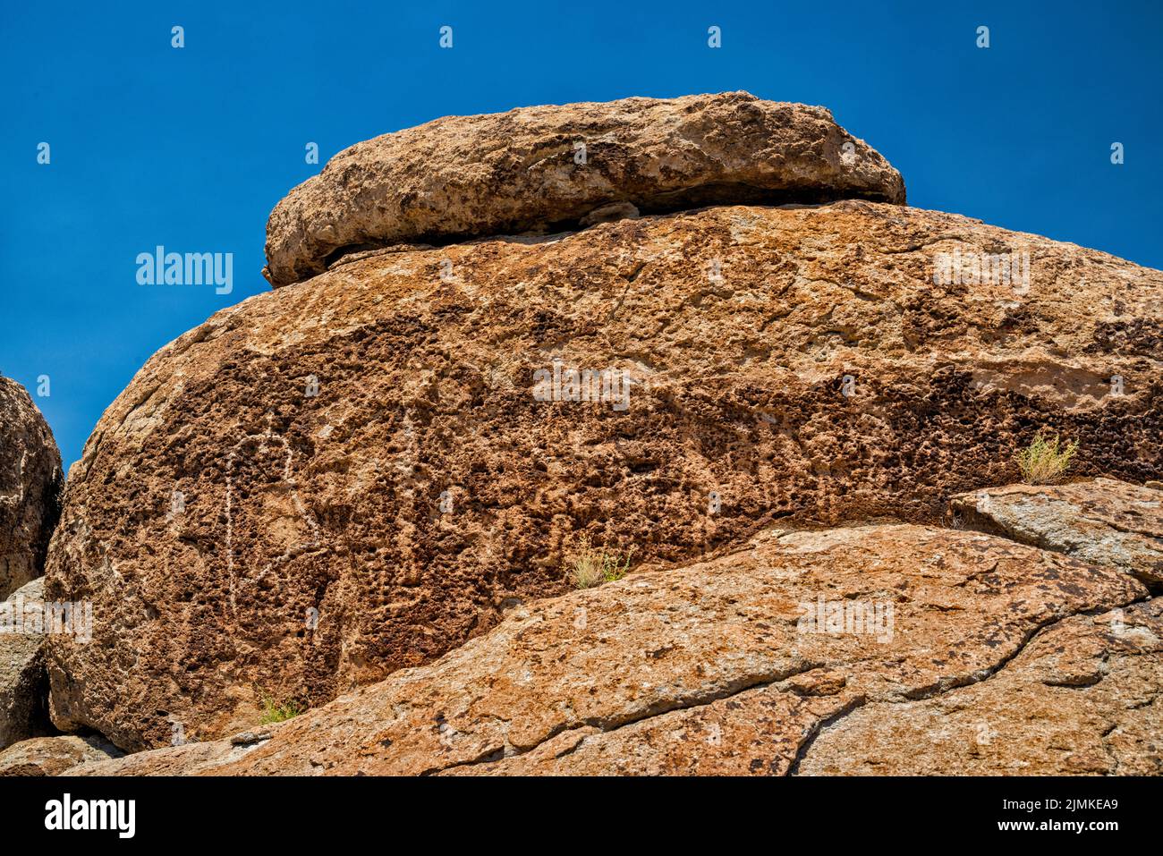 Petroglyphs at tuff rock boulder, Crystal Wash, Pahranagat Valley, near Ash Springs, Nevada, USA Stock Photo