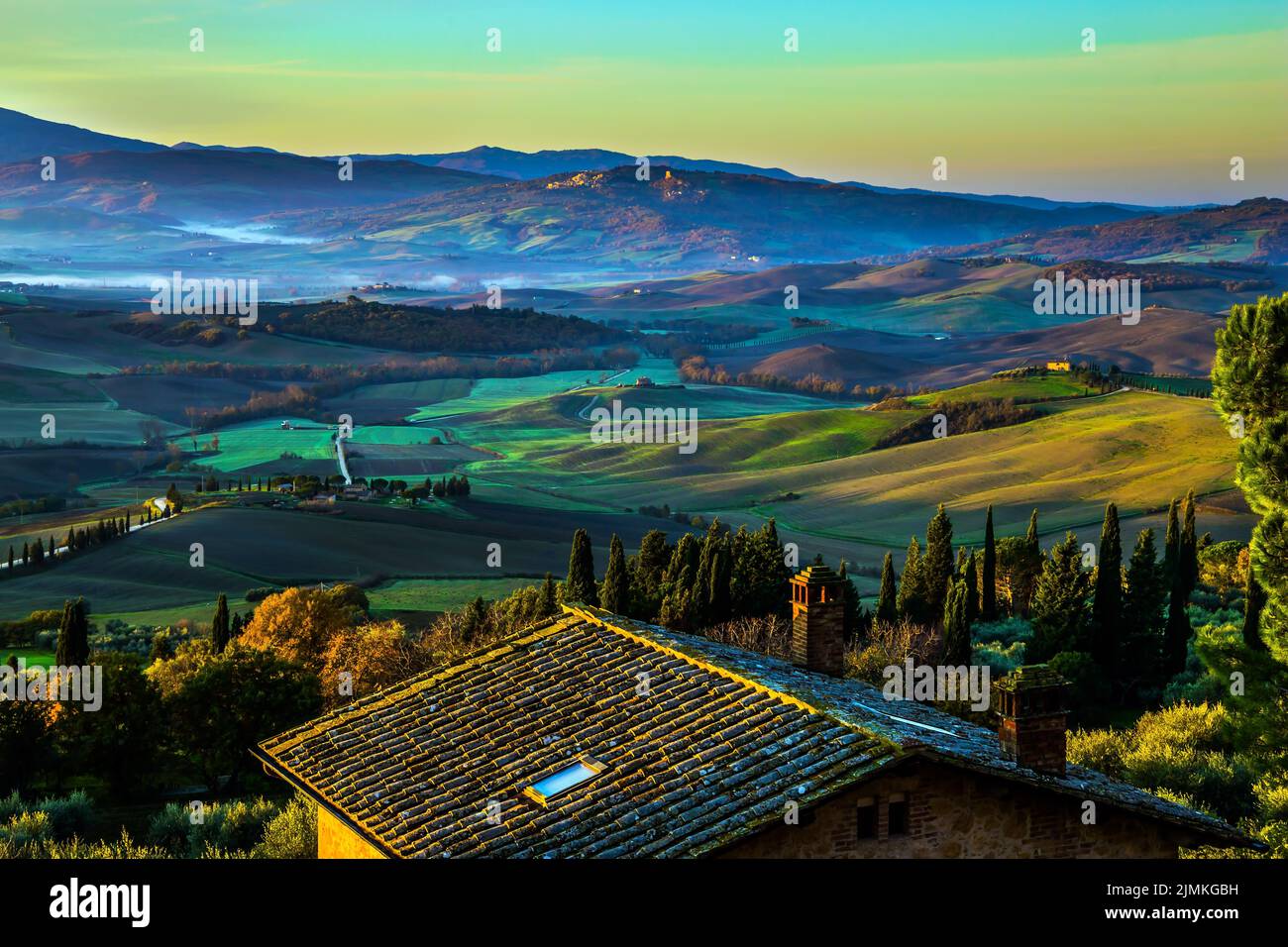 The sky is turning pink over Tuscany Stock Photo
